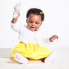 Baby girl's short white knitted bolero cardigan