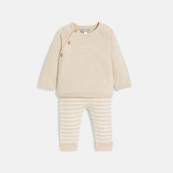 Baby girl's pink knitted jumper and trousers