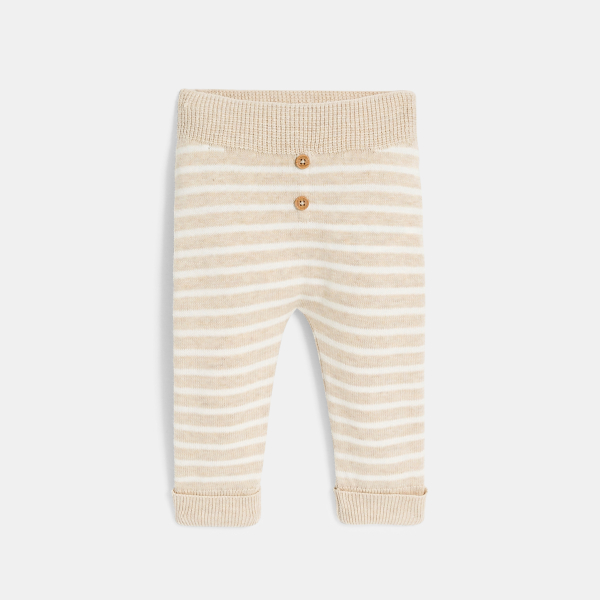 Baby girl's pink knitted jumper and trousers