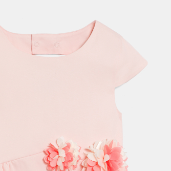 Girl's pink dress with cut-out flowers