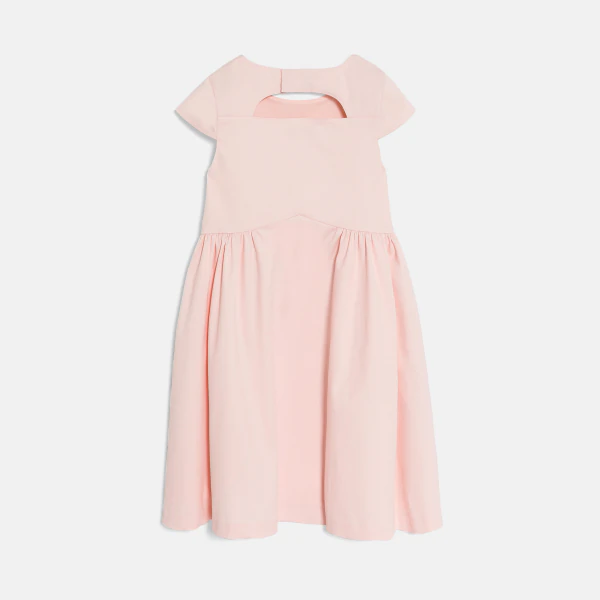 Girl's pink dress with cut-out flowers