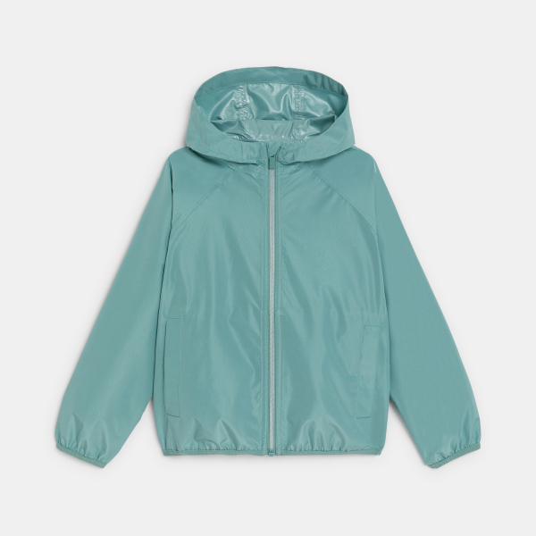 Boy's green waterproof windcheater jacket.