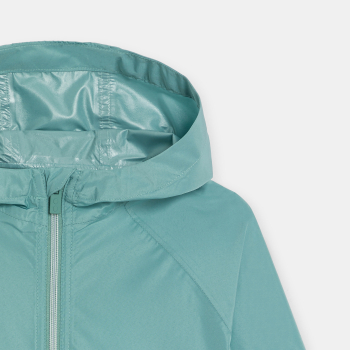 Boy's green waterproof windcheater jacket.
