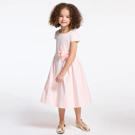 Baby girl's pink dress with textured rose
