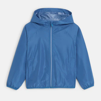 Boy's blue waterproof windcheater jacket.