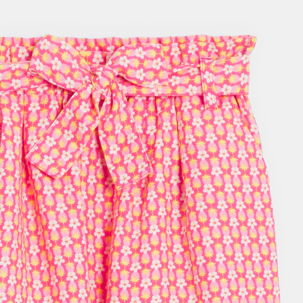 Girls orange printed wide leg trousers.