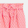 Girls orange printed wide leg trousers.