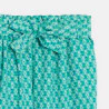 Girls green printed wide leg trousers.