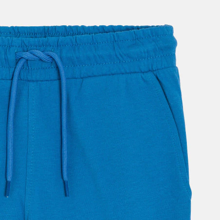 Jogging en molleton light uni bleu Garçon