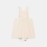 Baby girl's light pink twill dungaree dress