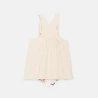 Baby girl's light pink twill dungaree dress