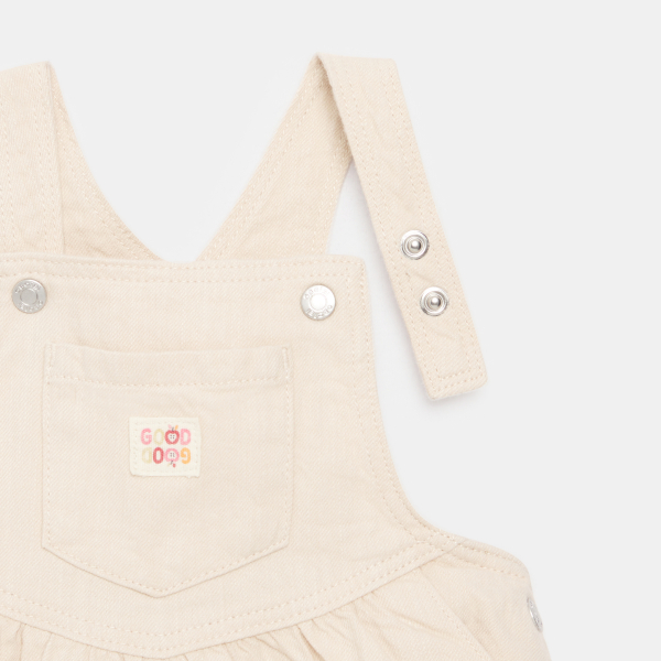Baby girl's light pink twill dungaree dress