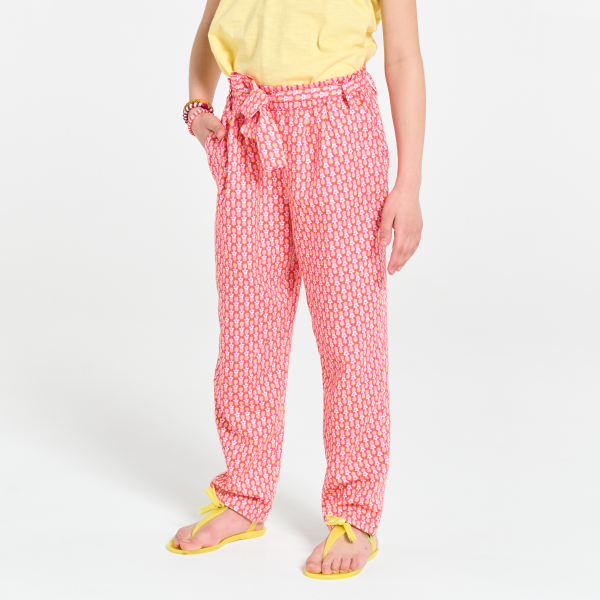 Girls orange printed wide leg trousers.