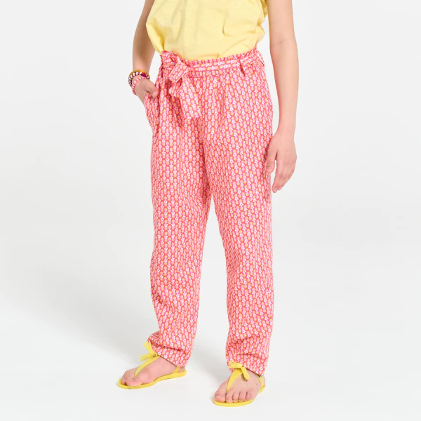 Girls orange printed wide leg trousers.