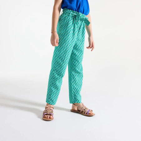 Girls green printed wide leg trousers.