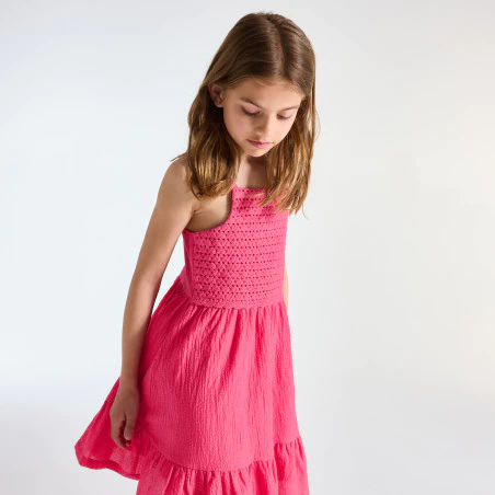 Girl's pink crochet and ruffle detail strappy dress
