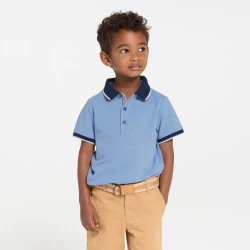Boy's sky blue jersey piqué polo shirt with short sleeves