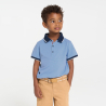 Boy's sky blue jersey piqué polo shirt with short sleeves