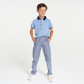 Boy's blue jersey piqué printed polo shirt with short sleeves