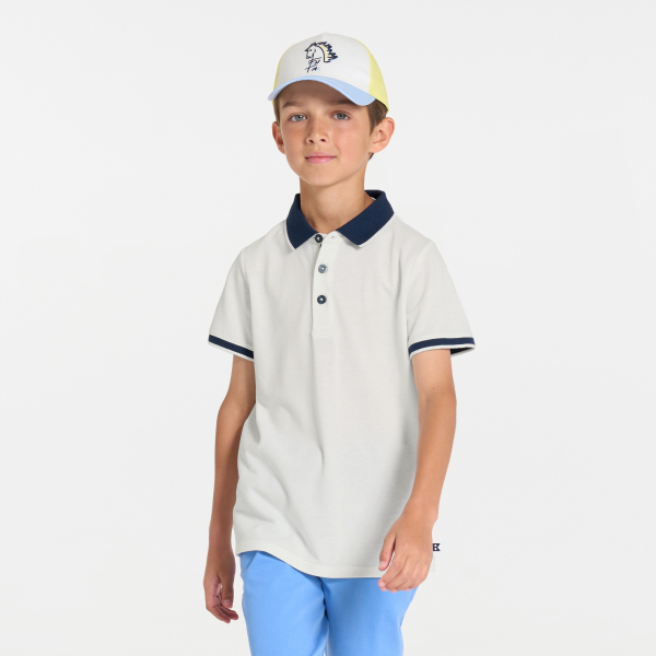 Boy's white jersey piqué polo shirt with short sleeves