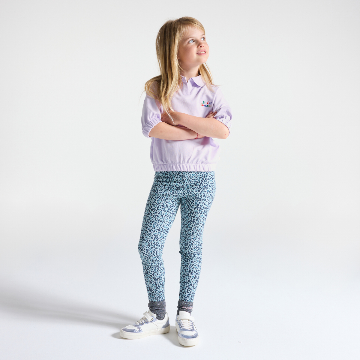 Girl's mauve short-sleeve sweatshirt with polo-shirt collar Girl's mauve short-sleeve sweatshirt with polo-shirt collar