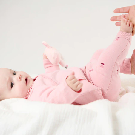Newborn baby girl's pink floral knitted jumper and trousers