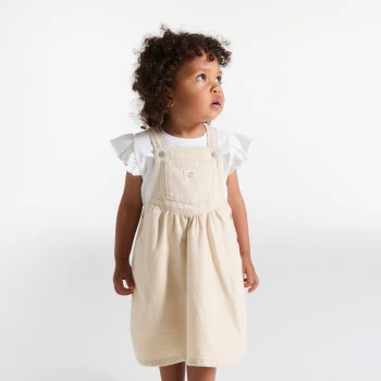 Baby girl's light pink twill dungaree dress