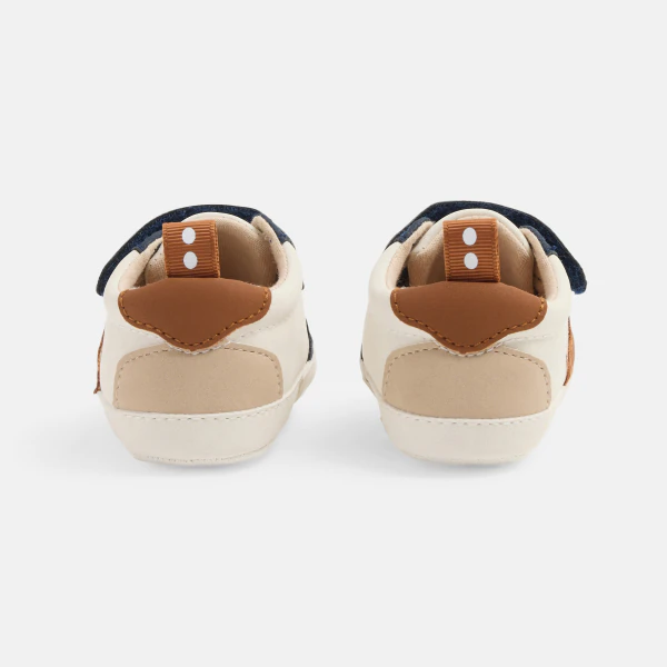 Newborn boy's blue low-top trainers
