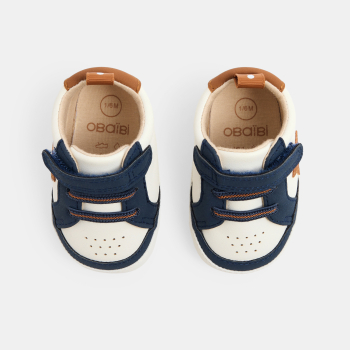 Newborn boy's blue low-top trainers