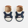 Newborn boy's blue low-top trainers